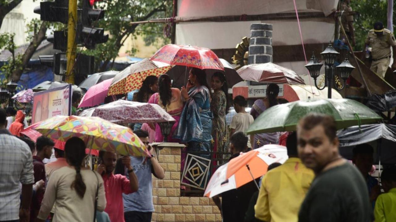 IN PHOTOS: Devotees mark Ganpati Visarjan amid heavy rains in Mumbai