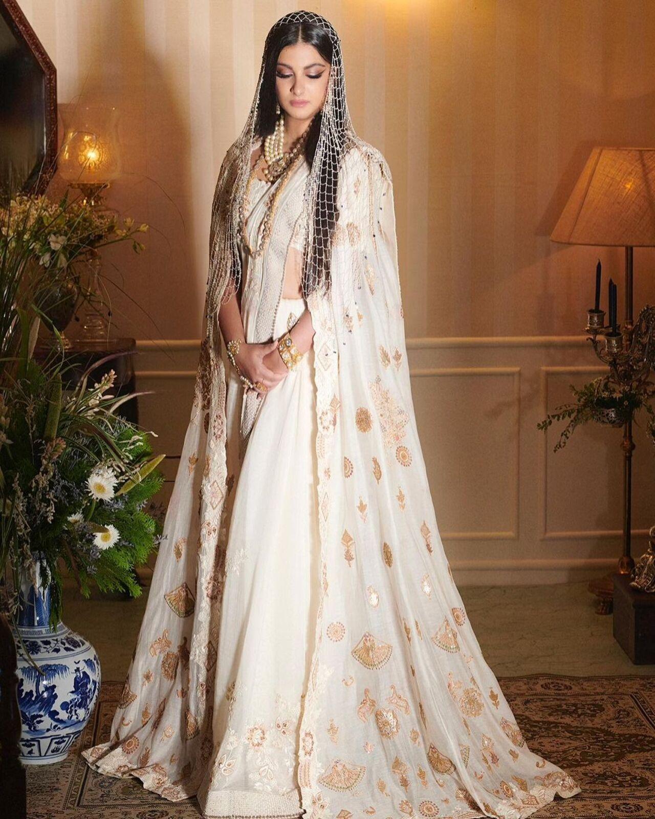 Rhea Kapoor made for a stunning bride in a white saree. It was her pearl veil that elevated the look and gave it a trendy touch
