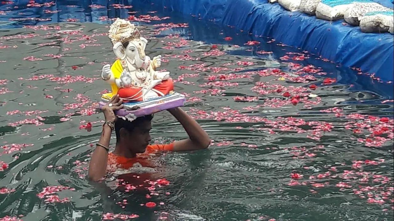 Devotees bid adieu to Lord Ganesh in Pune
