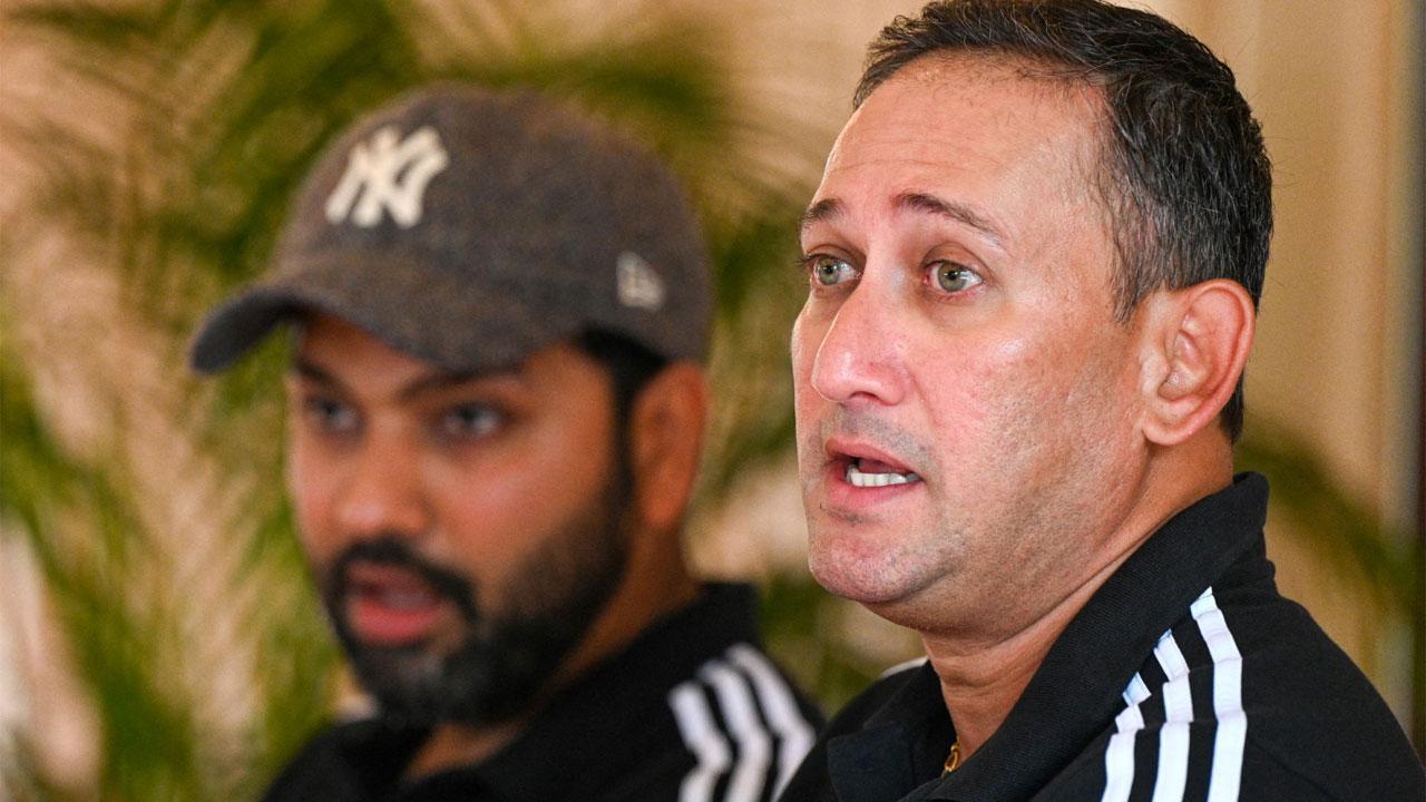 India`s chief cricket selector Ajit Agarkar (R) speaks as team captain Rohit Sharma watches during a press conference (Pic: AFP)