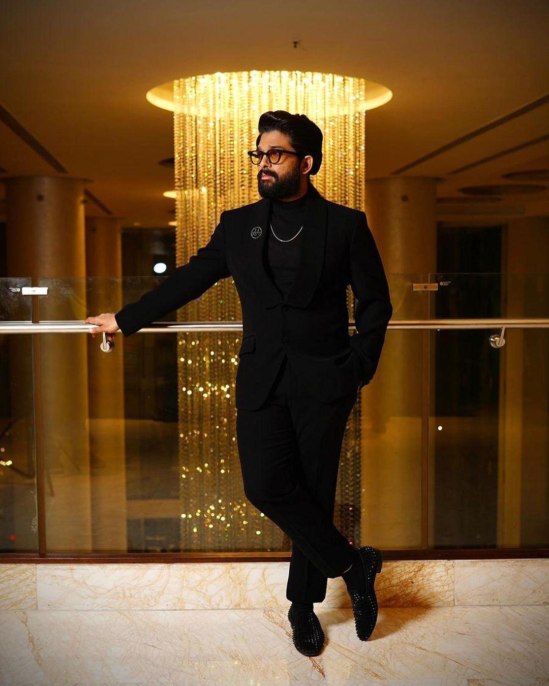 Allu Arjun is a master of styling when it comes to three-piece suits. Yet another look, and we are sold. The actor makes his fans drool as he dons a striking black three-piece suit. To accessorize the appearance, he added a gold chain and a stylish brooch
