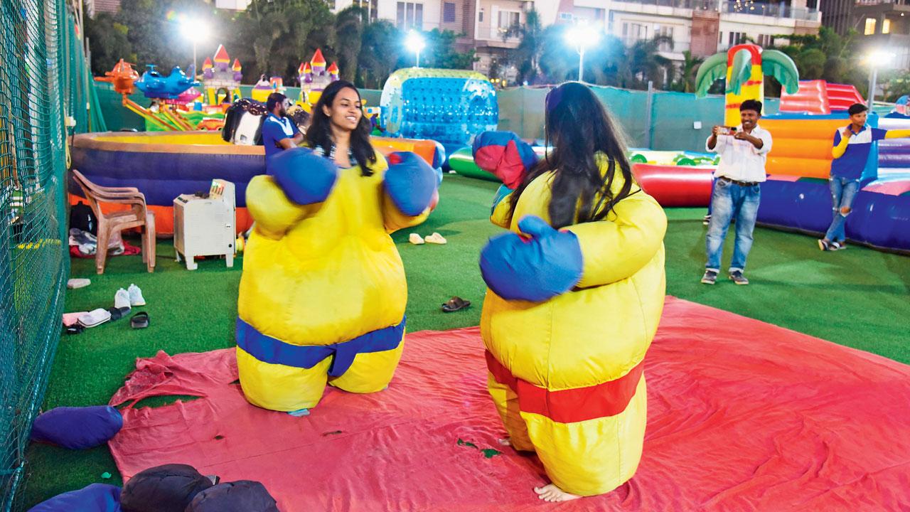 A visitor in a sumo suit