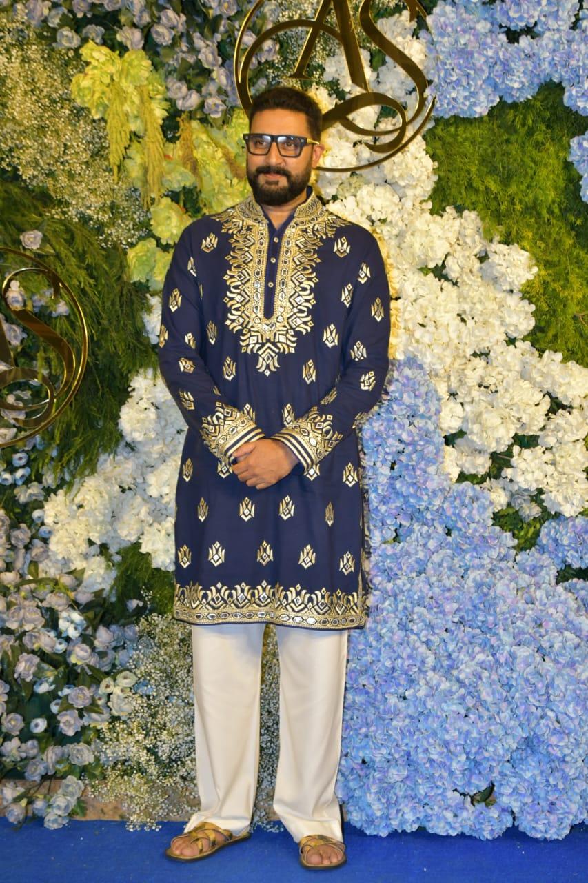 Abhishek Bachchan wore a beautiful embroidered blue kurta and paired it with white pyjama for his outfit for the event