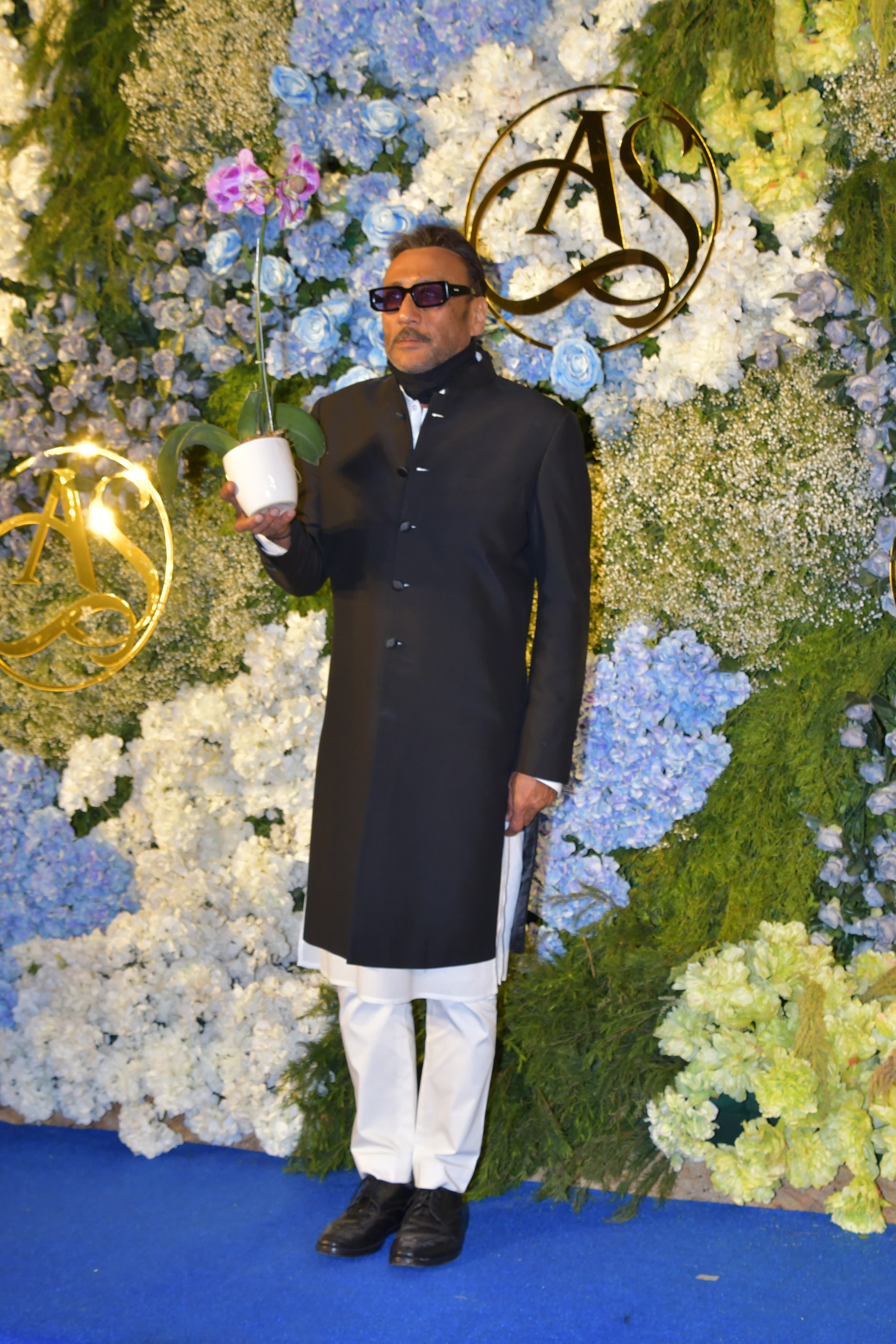Jackky Shroff with his cute plant posed for cameras
