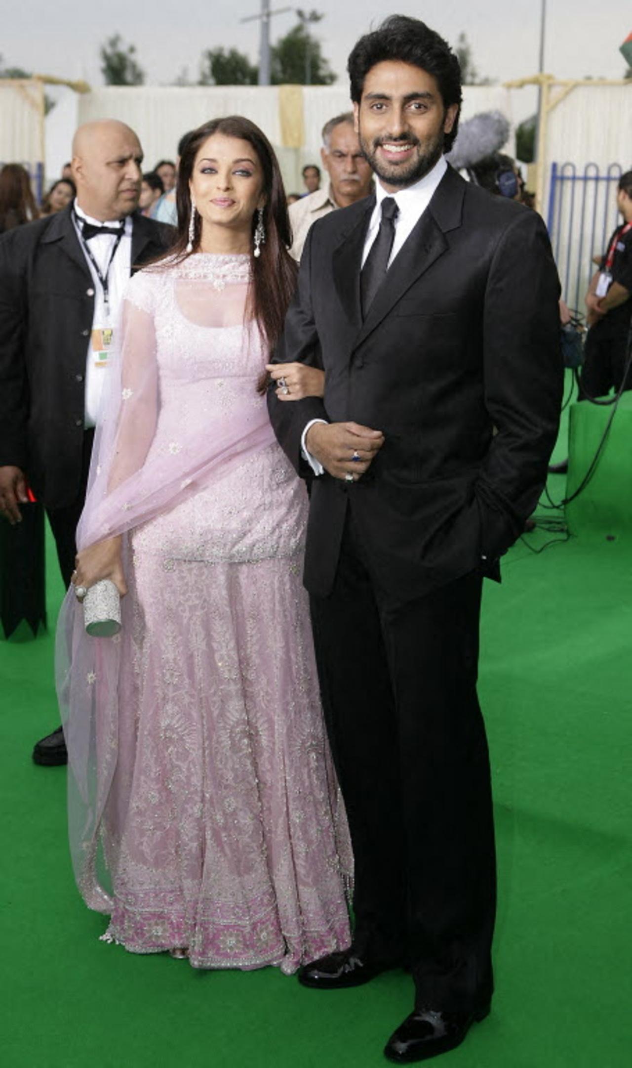 Aishwarya and Abhishek at the 2007 Indian Film Academy Awards (IIFA) at Hallam Arena in Sheffield, northern England. Aishwarya wore a lilac sharara set while Abhishek wore a classic black-tie two-piece. 