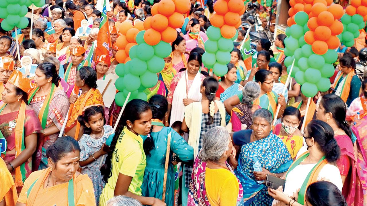 BJP’s women cadre await the arrival of Union Minister Niramala Sitharaman at Gandhipuram, Coimbatore, on Saturday