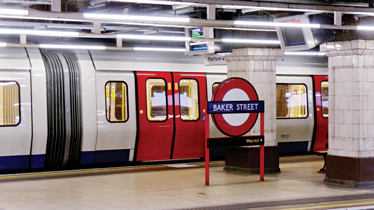 Anupam Sah points out the London Underground roundel (in pic: Baker Street)