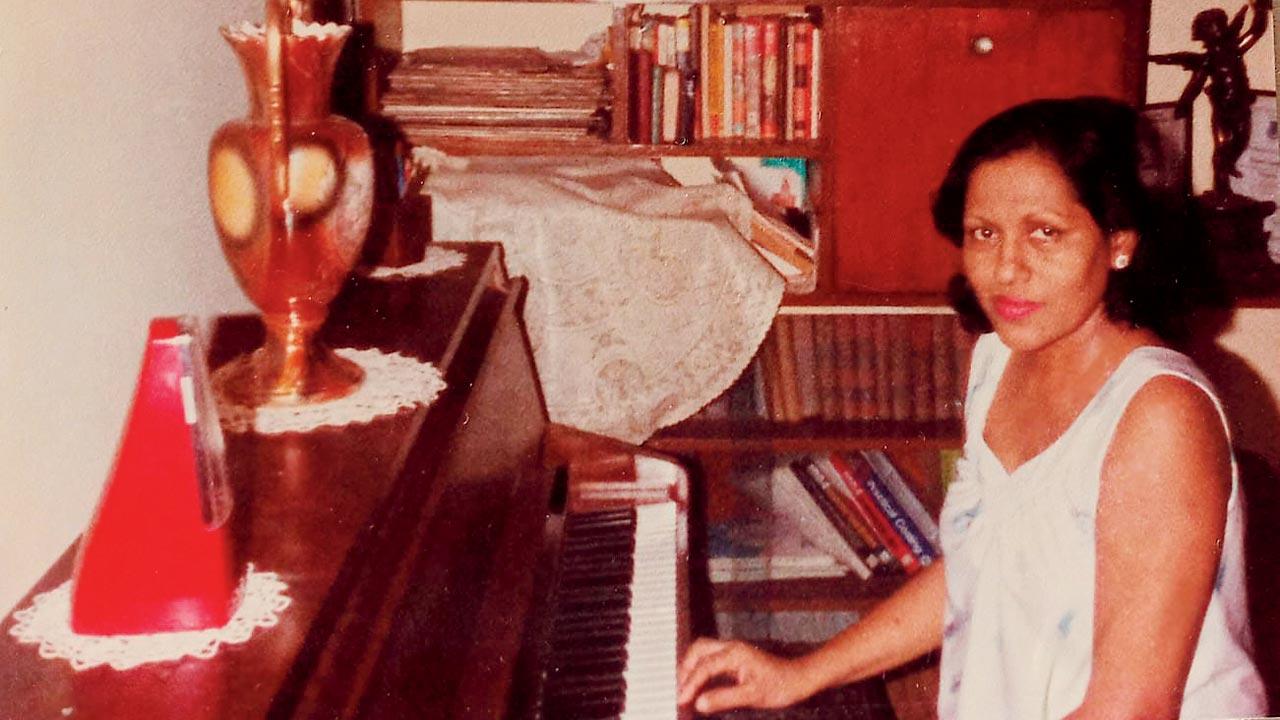 An early photograph of Blanche playing a piano at home