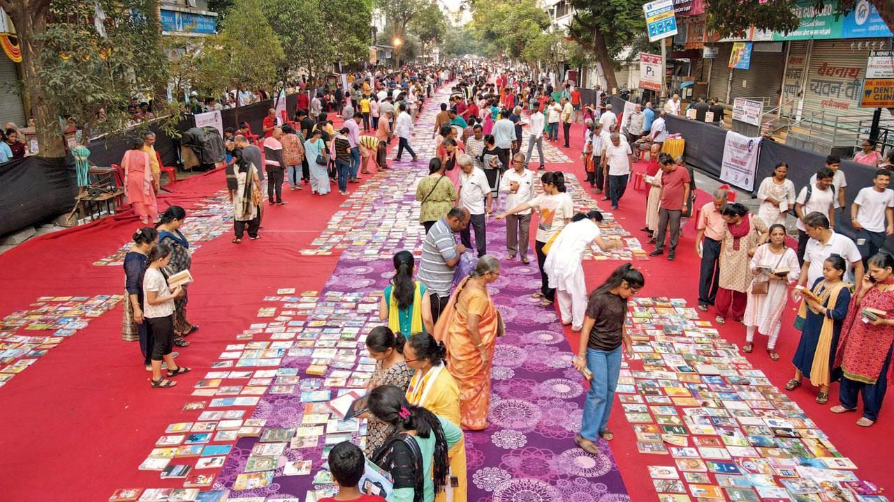 Residents look through the collection spread out on Phadke Road in the 2023 edition