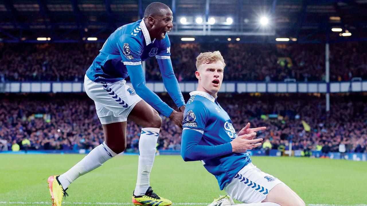 Jarrad Branthwaite (right) celebrates Everton’s opening goal