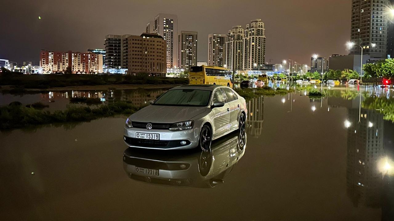 Cars were seen being stranded on flooded streets following heavy rains in Dubai. File Pic/AFP