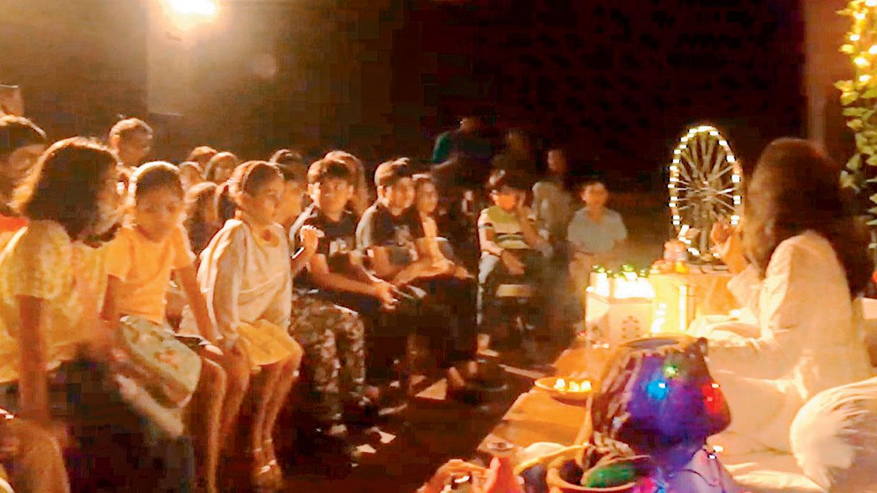 Children interact with the duo at a previous performance