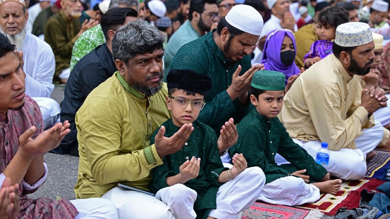 Muslims in Bangladesh come together to offer prayers to celebrate Eid-ul-Fitr, as people around the world end the holy fasting period of Ramadan.