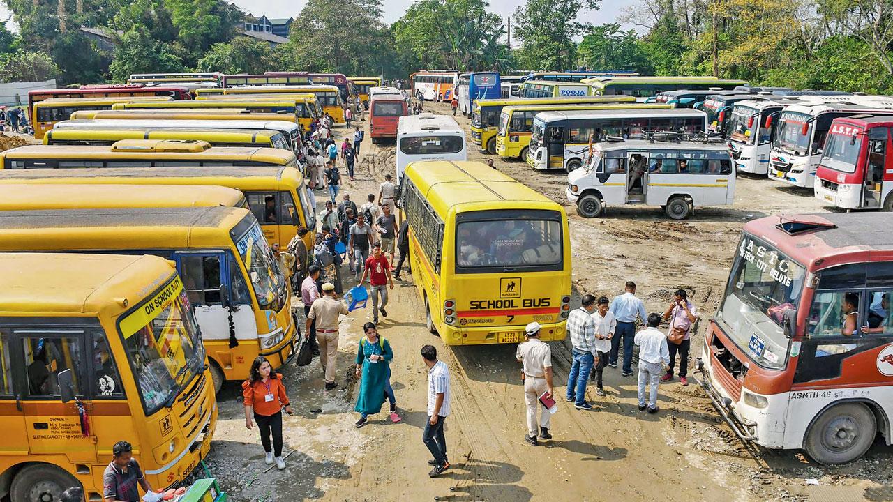 Vehicles requisitioned for first phase parked in Tinsukia, Assam. pic/pti 