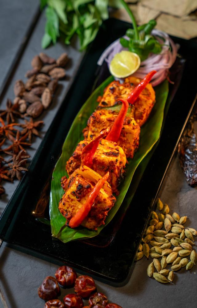 Indulge in flavours of Old Delhi as you sample specialties like nihari, keema kaleji, and butter-laden parathas, reminiscent of the city`s bustling streets