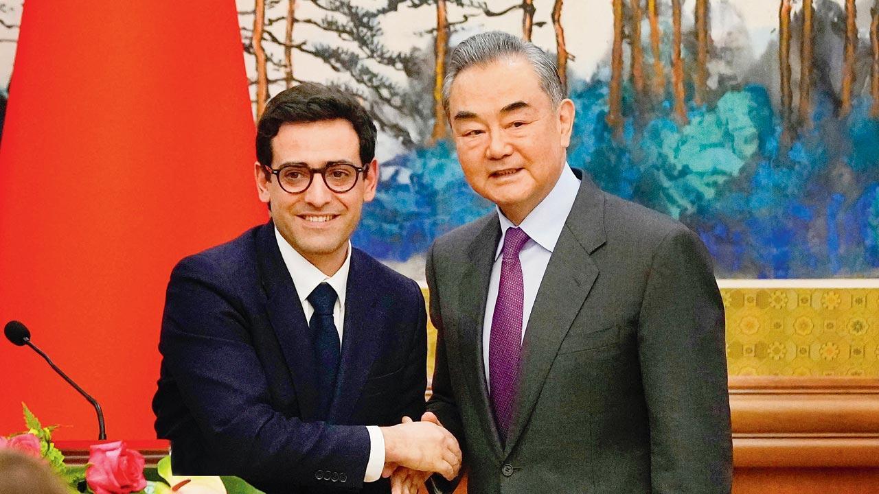 France presses China on trade, Ukraine