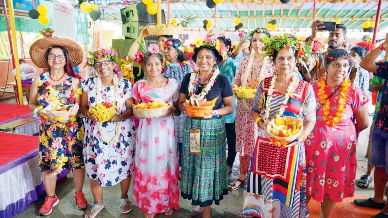 People celebrate the festival with Goan traditions on Dharavi island