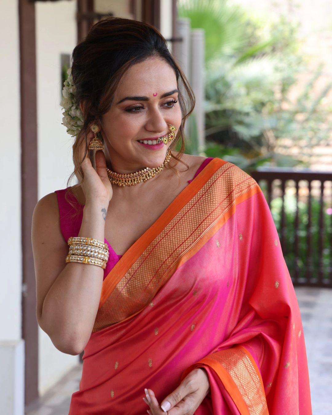  Amruta wore intricate jewellery to elevate her appearance. The actress's golden choker, small jhumkas, and big nath were a total hit