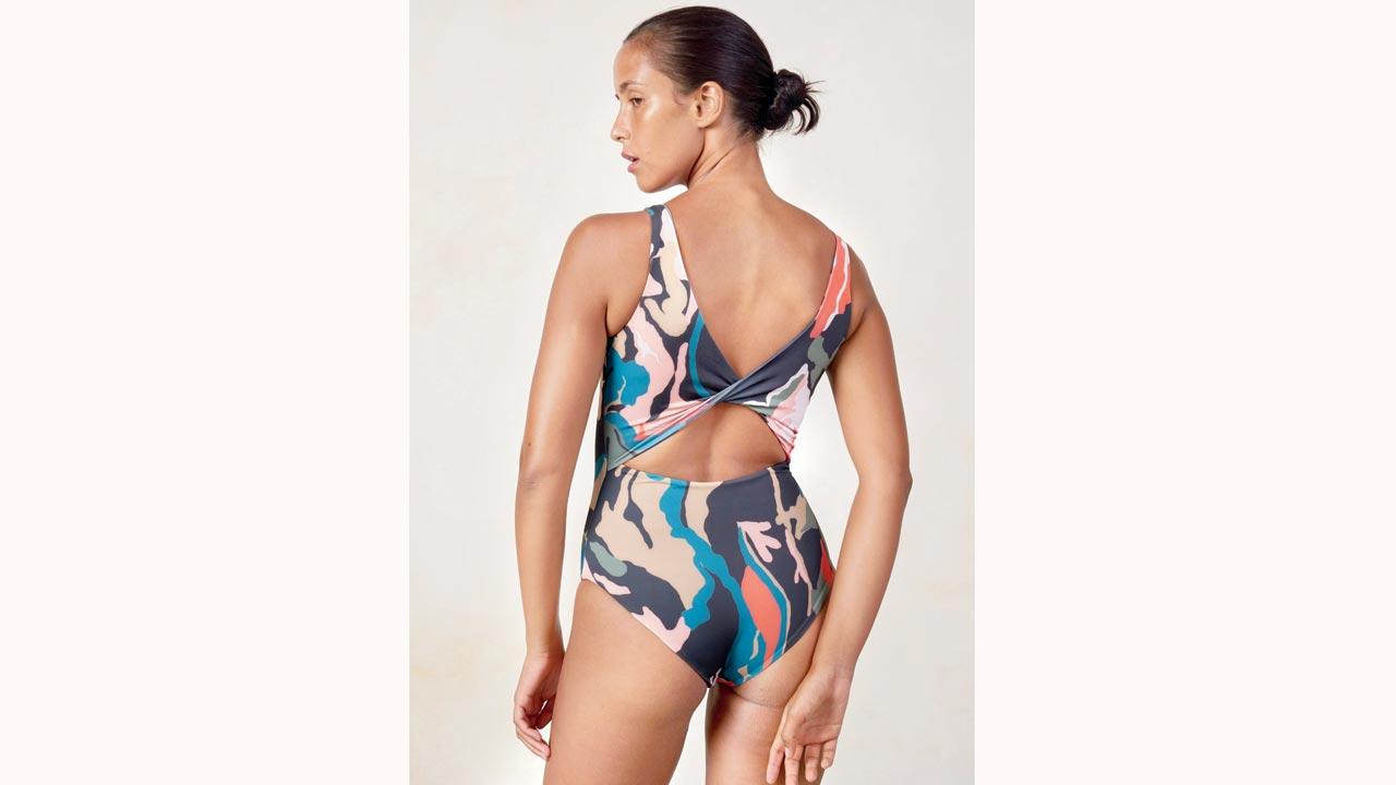 The Summer House’s scoop neck swimsuit with twisted back details, crafted from Econyl, comprises 78 per cent polyamide and 22 per cent elastane, with the lining made of 83 per cent recycled polyamide and 17 per cent elastane. Elastane, the primary component in swimwear, sculpts and contours the body