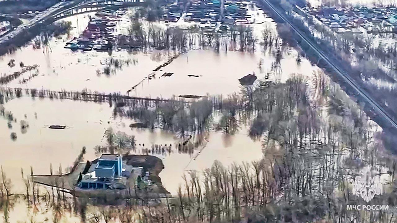 Russians in rare protest after homes flood in dam burst