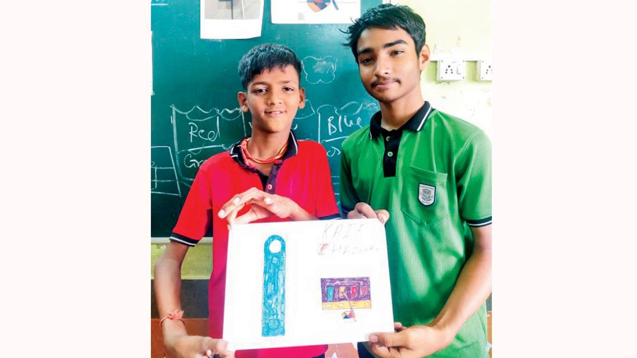 Hazrat Ali Shaikh (left, in red), who has been attending Saturday Art Class for the past three years, holds up an artwork with his friend 