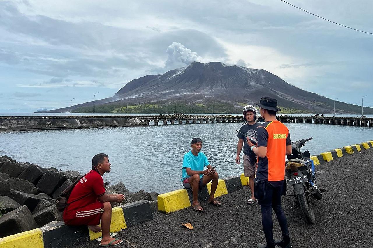 An international airport in Manado city, less than 100 kilometers (60 miles) from the erupting Mount Ruang, is still temporarily closed as volcanic ash was spewed into the air