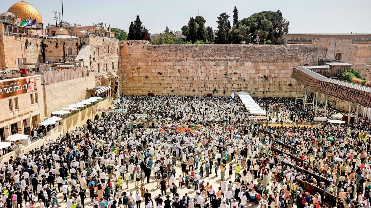 Jewish worshippers take part in the Cohanim prayer at the Western Wall in the Old City of Jerusalem on Thursday. Pic/AFP