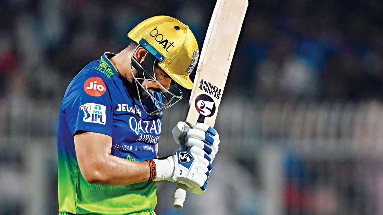 RCB’s Karn Sharma wears a dejected look after being dismissed in the last over
