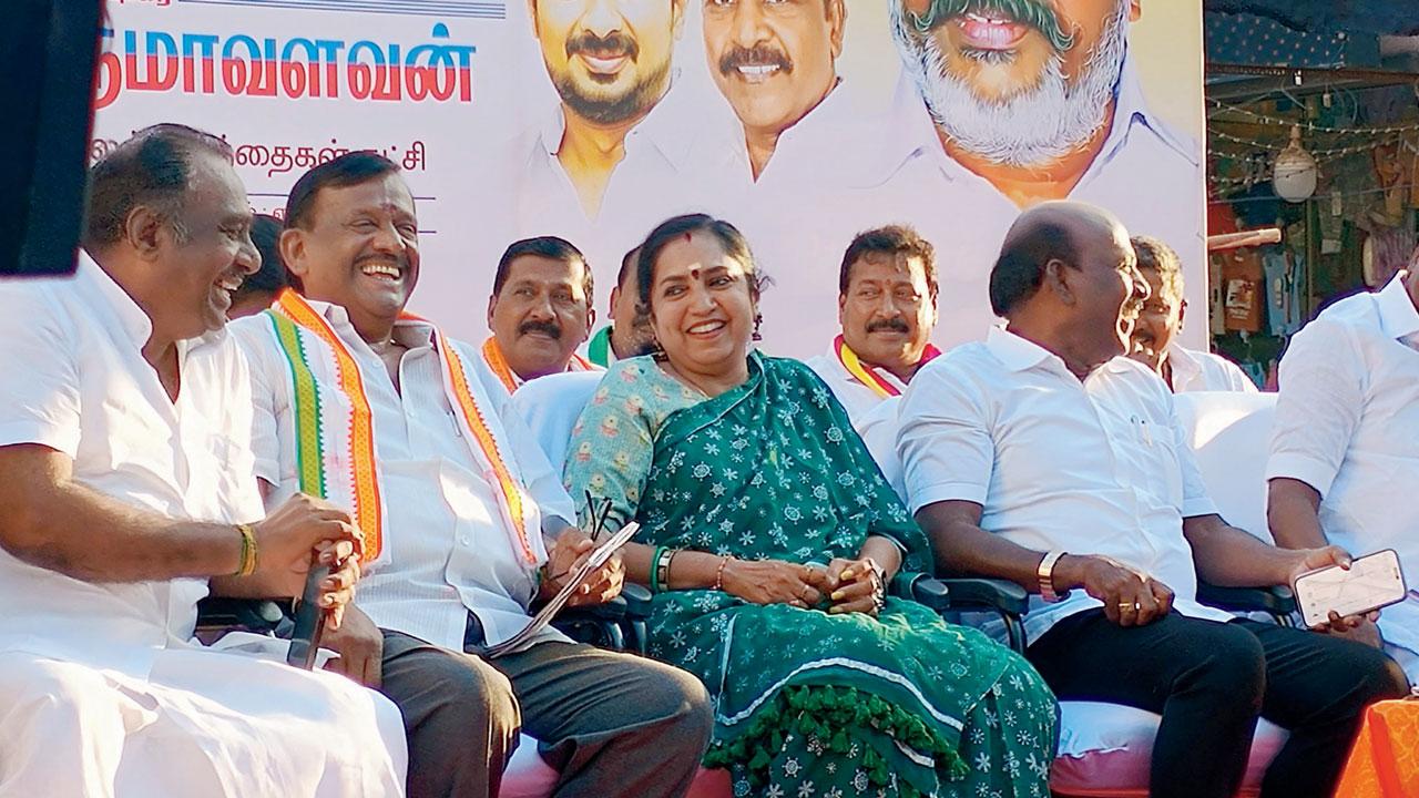 Dr Thamizhachi Thangapandian enjoys a dig made against her rivals by a warm-up speaker at a rally at Virugambakkam in her South Chennai constituency on April 11. Pic/Krishnakumar Padmanabhan