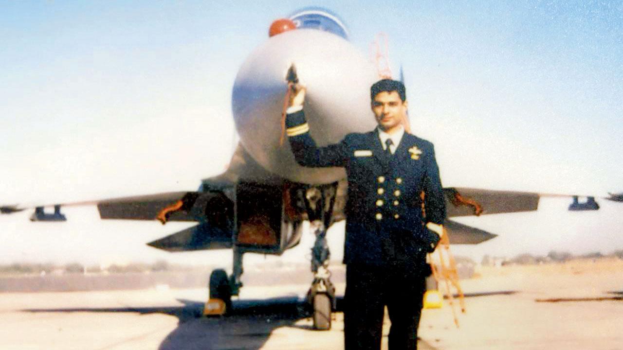 Manik Mehta with a fighter plane in 2000