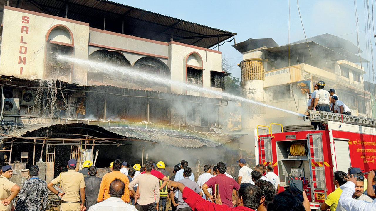 A fire tender tries to douse the fire