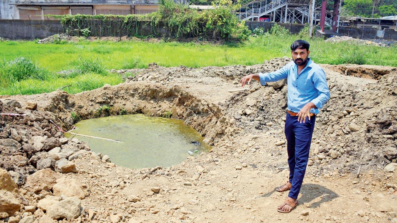Vijay Shegokar—the paternal uncle of six-year-old Ayush- says that the pit remains open and the entry from Phule Nagar to the railway land where work was undertaken was sealed only on Wednesday. Pics/Ashish Raje