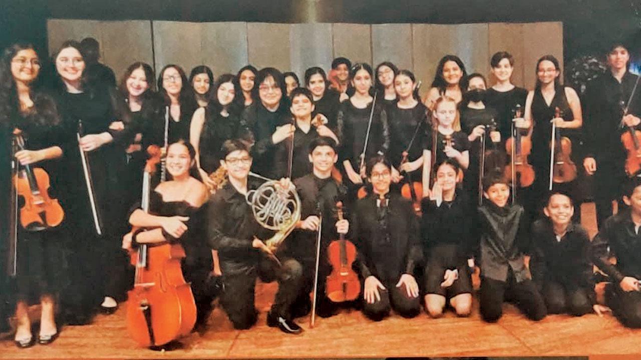 The academy orchestra with (centre standing) director Marat Bisengaliev