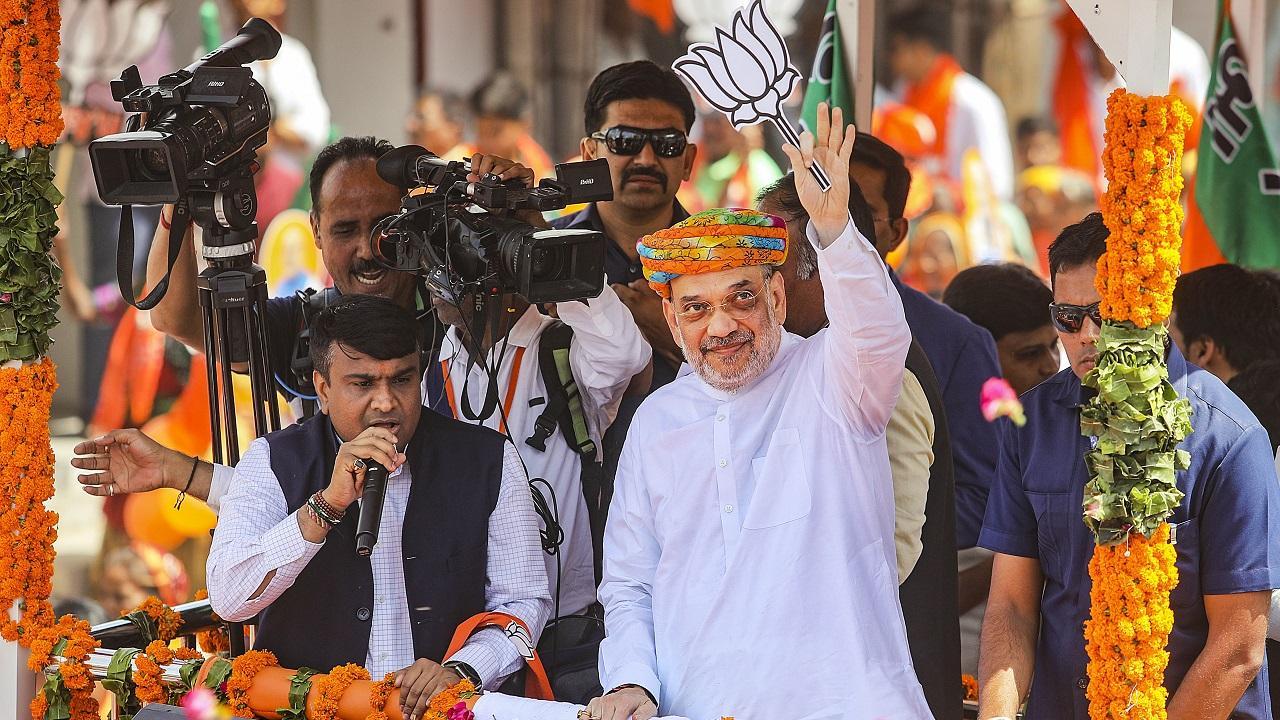 In Photos: Home Minister Amit Shah holds mega road show in Ahmedabad