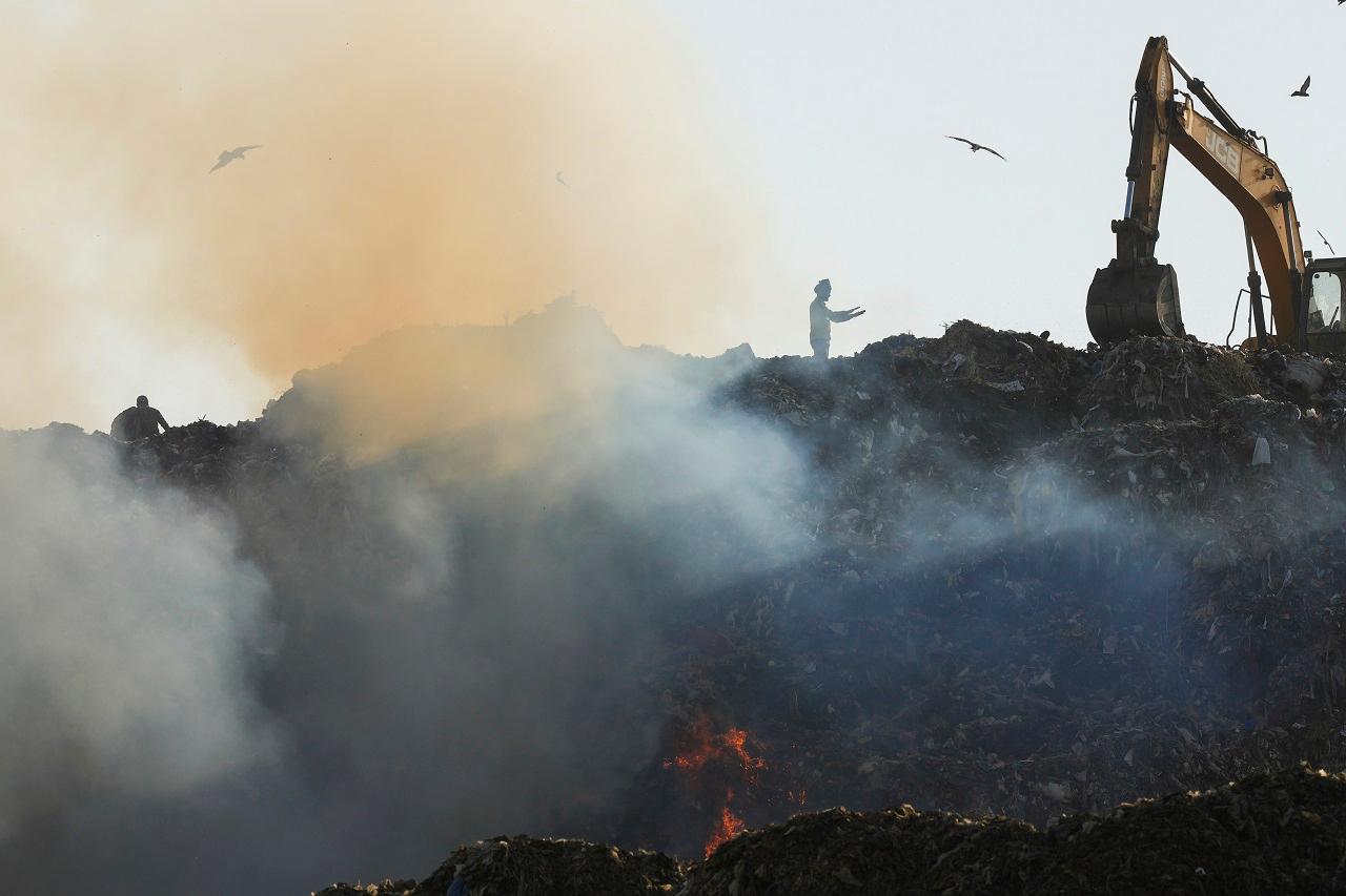 Plumes of smoke were seen rising from the dumping yard as firefighters toiled to bring the flames under control
