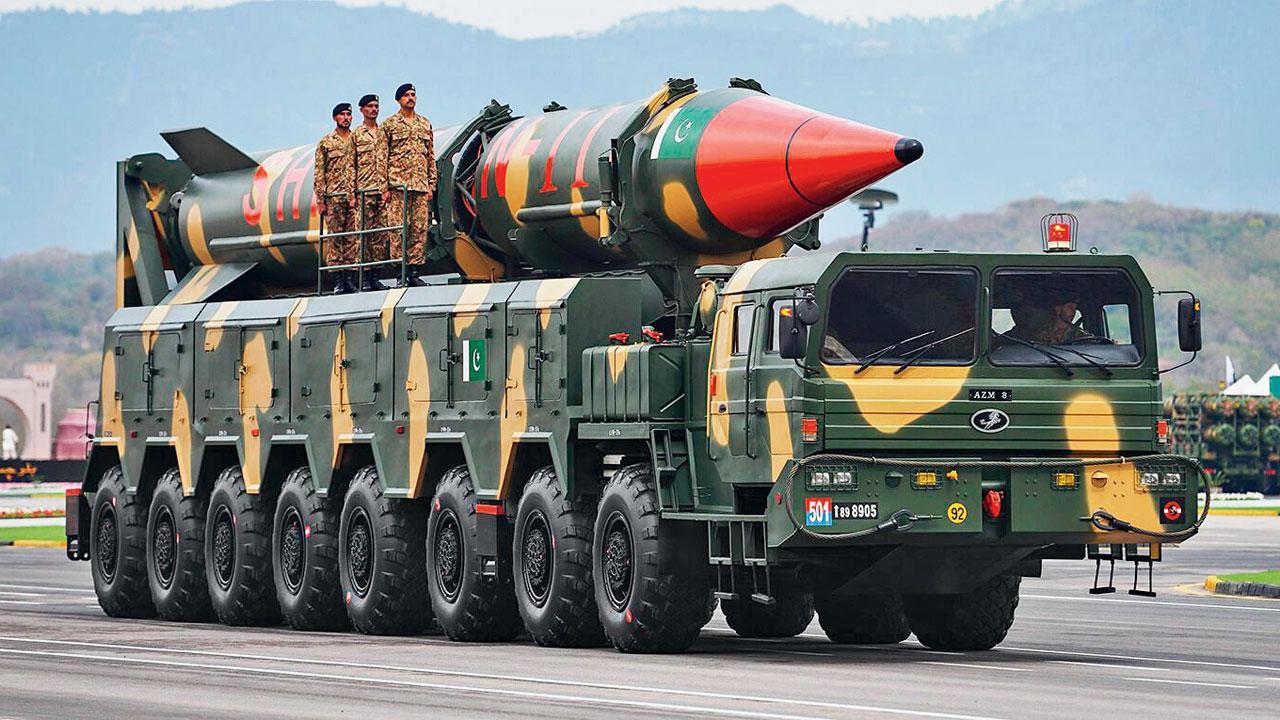 Pakistani military personnel stand beside a Shaheen II ballistic missile during a military parade in Islamabad. File Pic/X