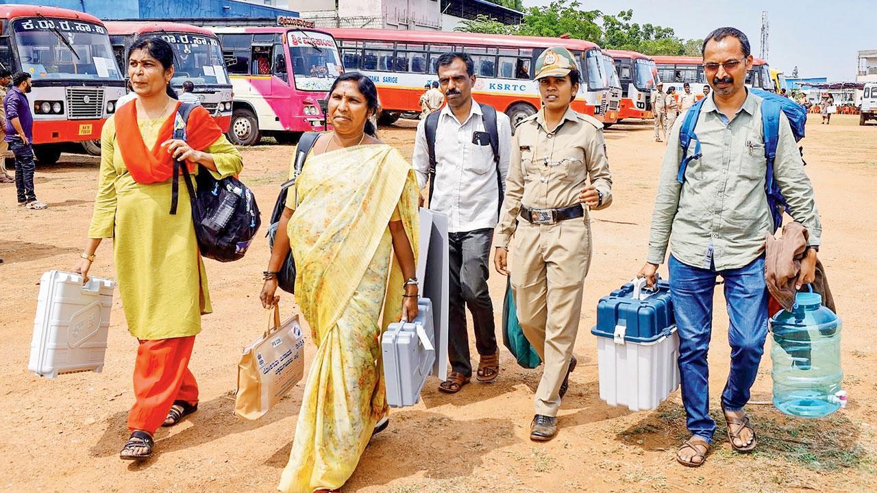 Polling officials leave for election duty in Karnataka