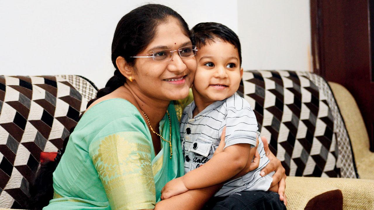 Pooja Tadas with her son at her residence