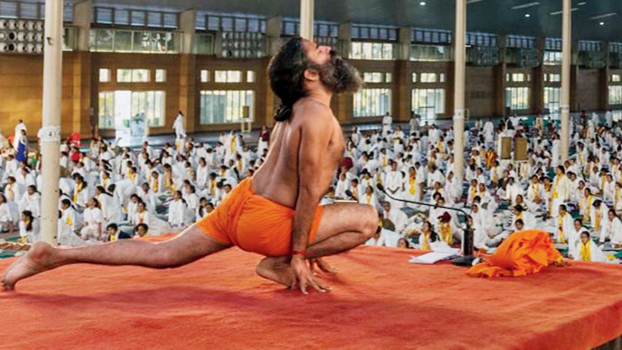 Baba Ramdev performing yoga