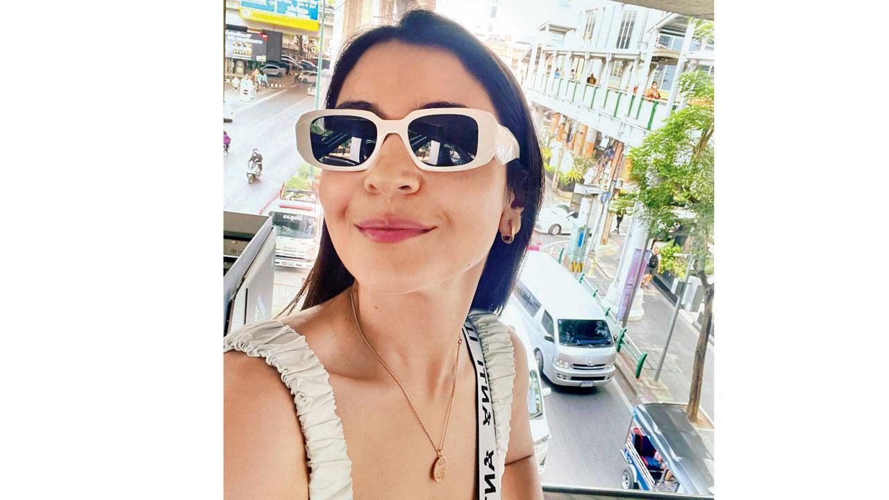 Anushka Sharma matches her white sunglasses to her outfit