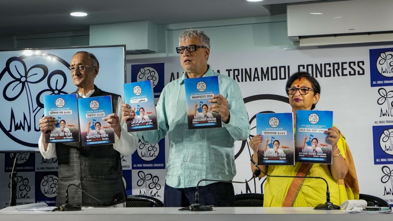 TMC leaders Amit Mitra, Derek O`Brien and Chandrima Bhattacharya release the party`s election manifesto for the Lok Sabha elections. Pic/PTI