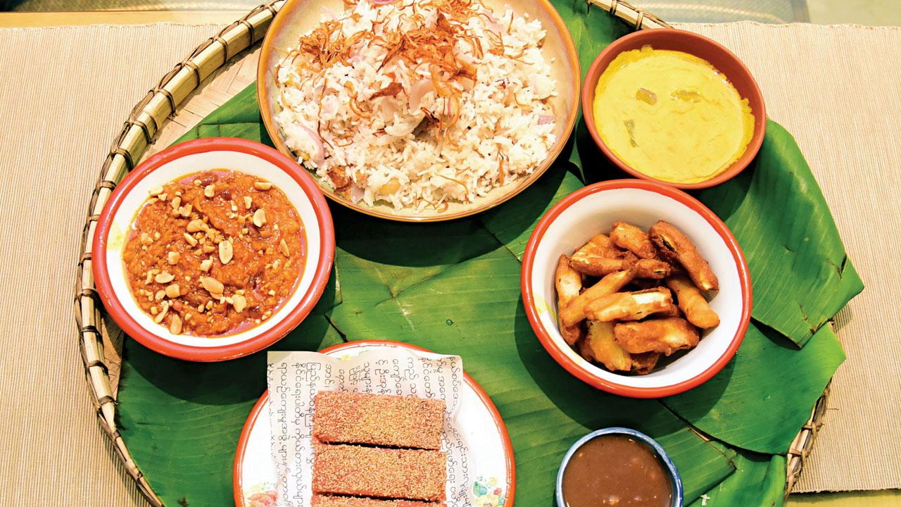 Thingyan thali with om thame, pumpkin curry, budhi chow, tamarind chutney, sanwin makin and mete sebai