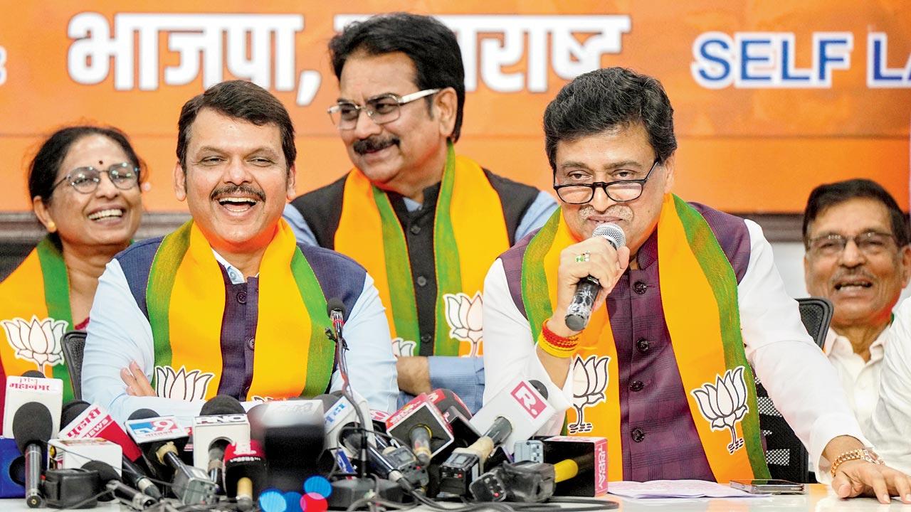 Ashok Chavan with Maharashtra Deputy Chief Minister Devendra Fadnavis addresses the media after joining BJP. File pic/PTI