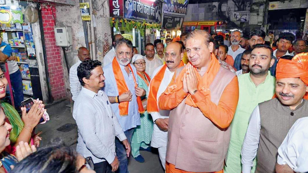 BJP candidate Mihir Kotecha canvasses for votes in the Mumbai North East constituency