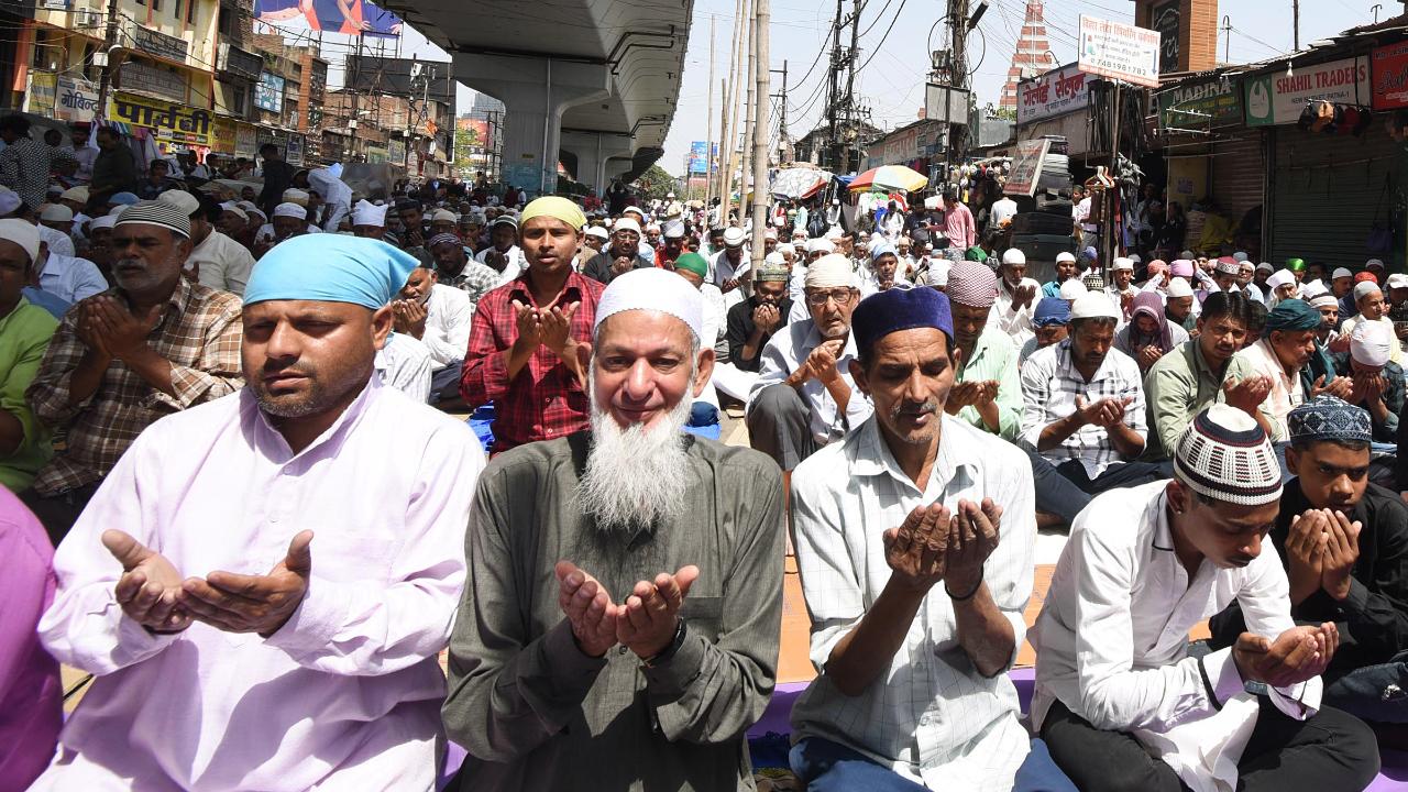 Muslim community people offer last Friday namaz during the ongoing Ramadan month, in Patna on Friday