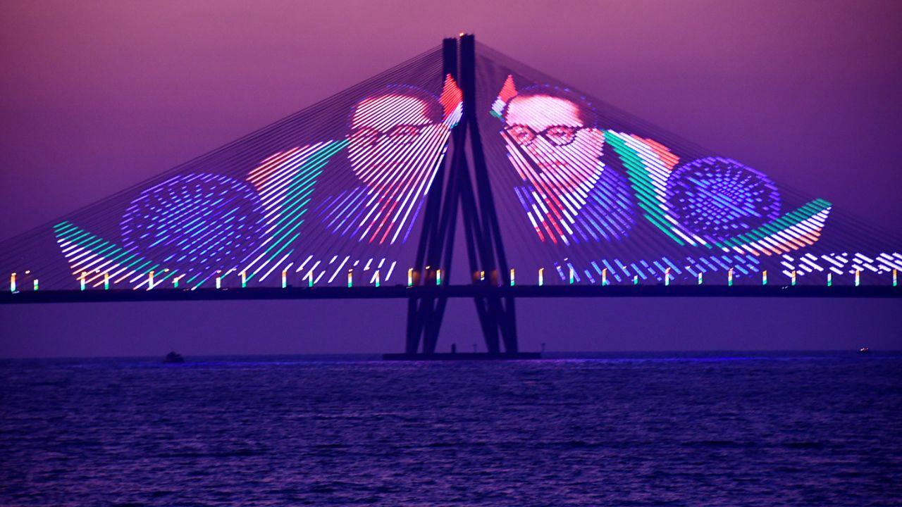 A laser and light show is being projected on the Bandra–Worli Sea Link on the eve of Ambedkar Jayanti, in Mumbai on Saturday. (ANI Photo)
