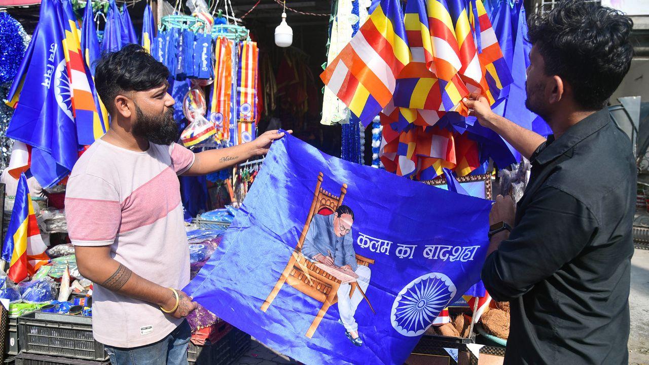 Followers show the Jai Bhim flag depicting the image of Dr Bhimrao Ambedkar on the eve of his birth anniversary in Nagpur on Saturday. (ANI Photo)