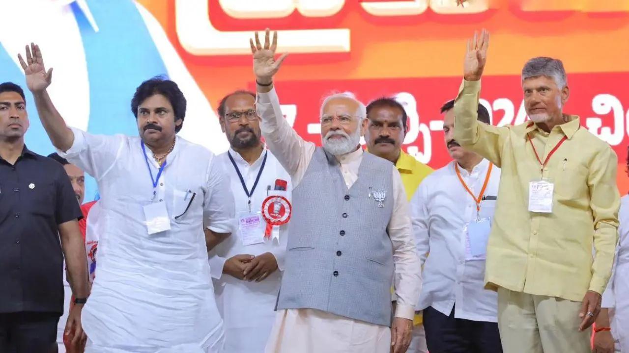 Pawan Kalyan, PM Modi and N Chandrababu Naidu at NDA rally in Andhra Pradesh/ PTI