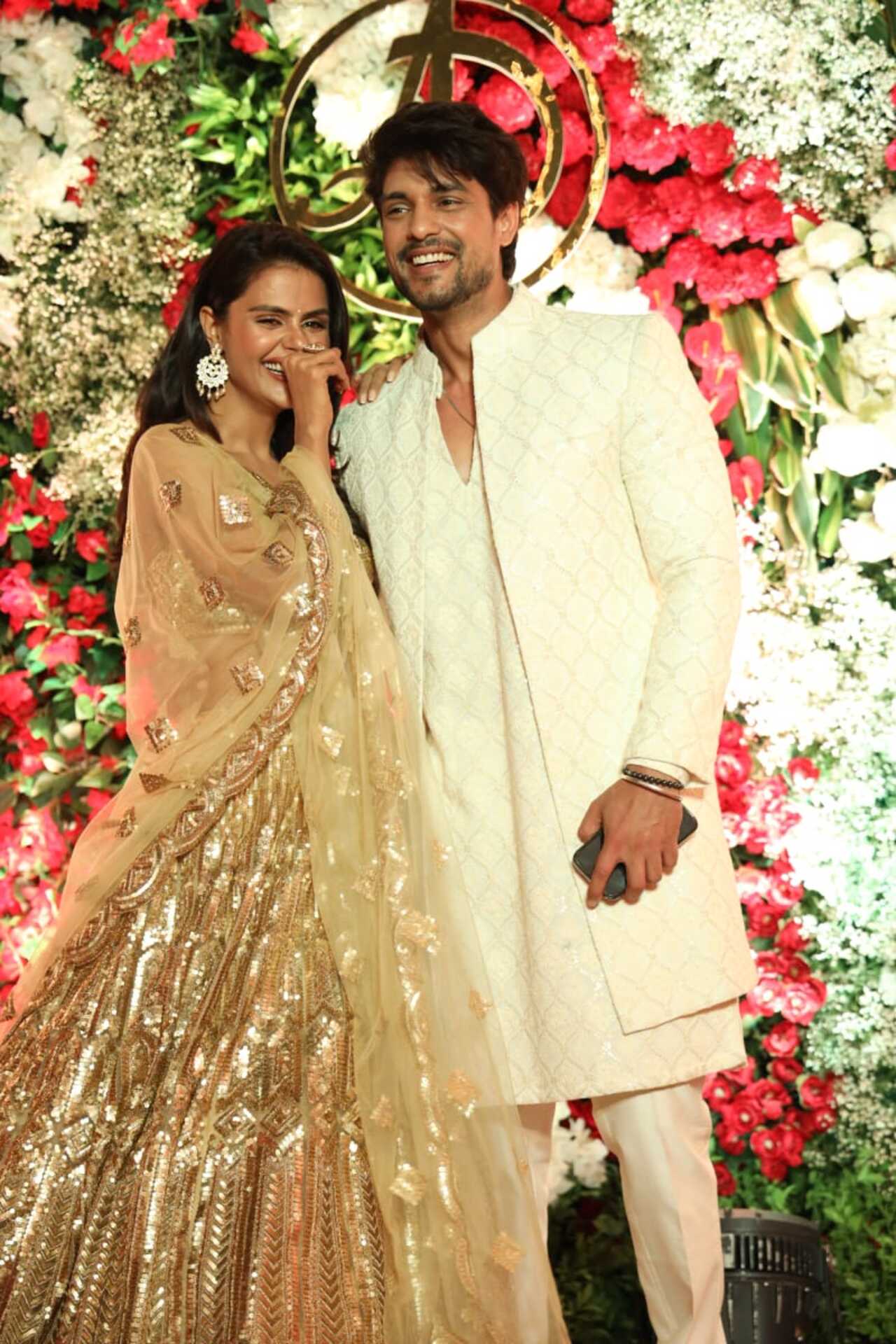 Priyanka Chahar Chaudhary and Ankit Gupta could not stop smiling as they posed together for the paparazzi