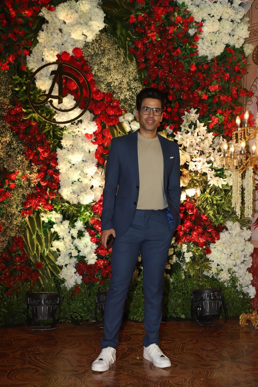 Tusshar Kapoor looked stylish in a blue suit with a beige undershirt as he smiled for the cameras.